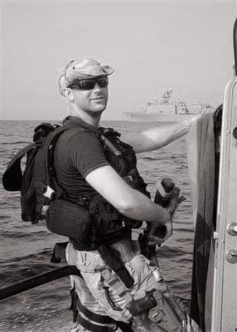 Justin Myers on patrol boat